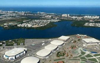 Aerial view of Barra Olympic Park and surrounding landscape during Rio de Janeiro helicopter tour.