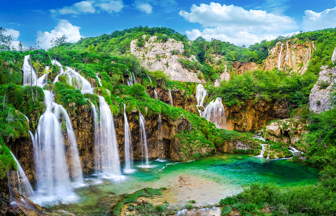 Fishes swimming in Plitvice Lakes National Park, Croatia.