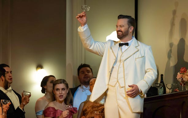 Opera performers toasting during La Traviata at Sydney Opera House.