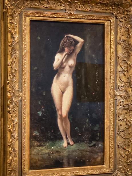Painting of a nude figure in a gold frame at Prado Museum, part of Paseo del Arte pass.