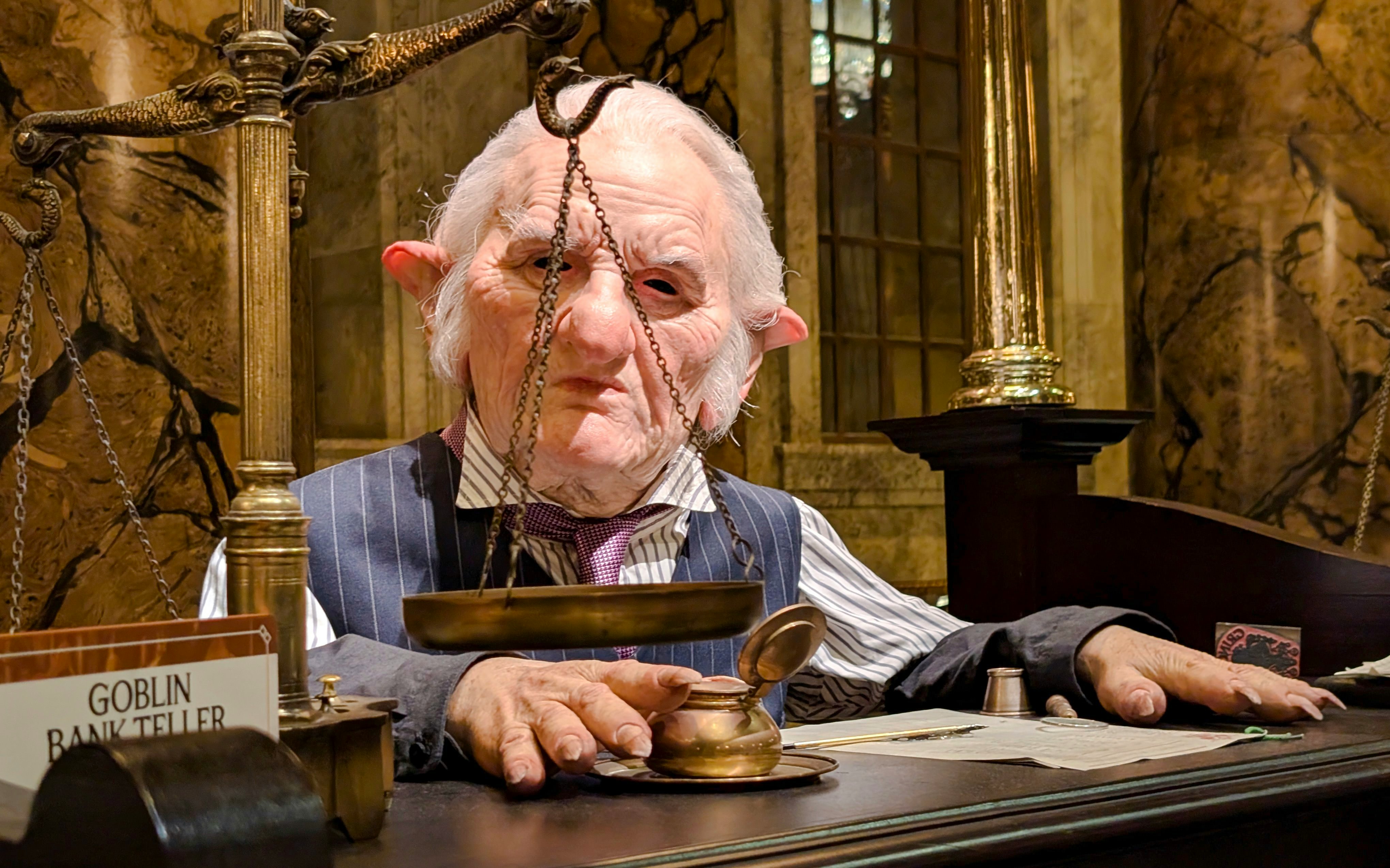 Goblin bank teller at Gringotts Wizarding Bank from Harry Potter.