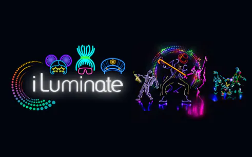 iLuminate dancers performing in neon lights against a dark background.