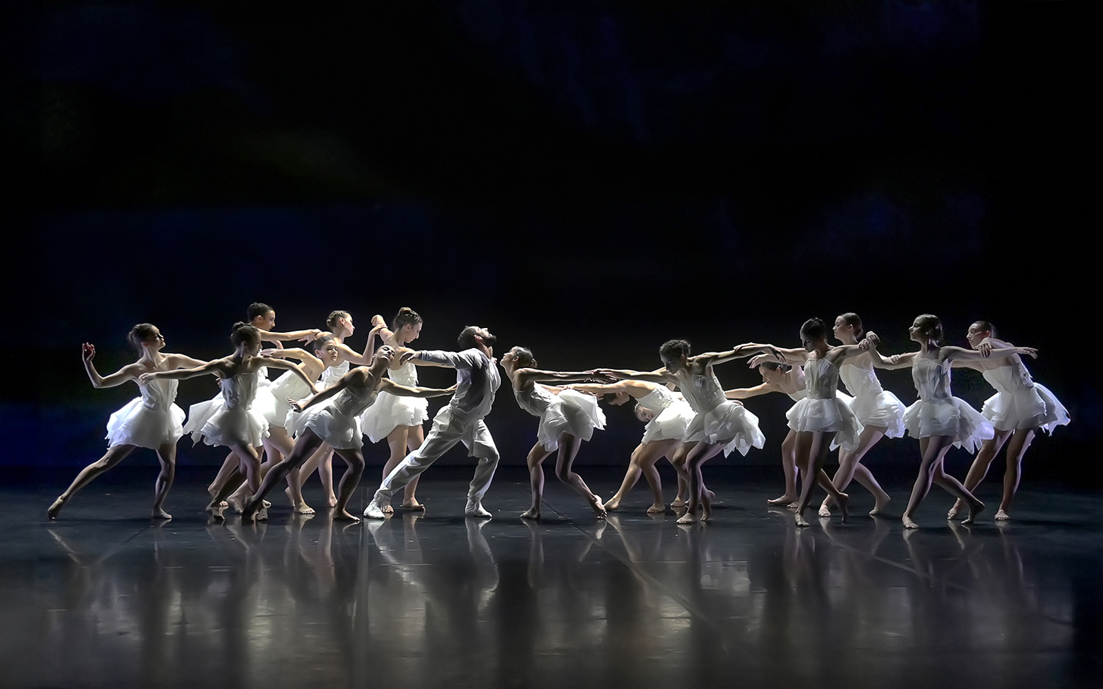 Dancers performing Ballet Preljocaj's Swan Lake on stage.