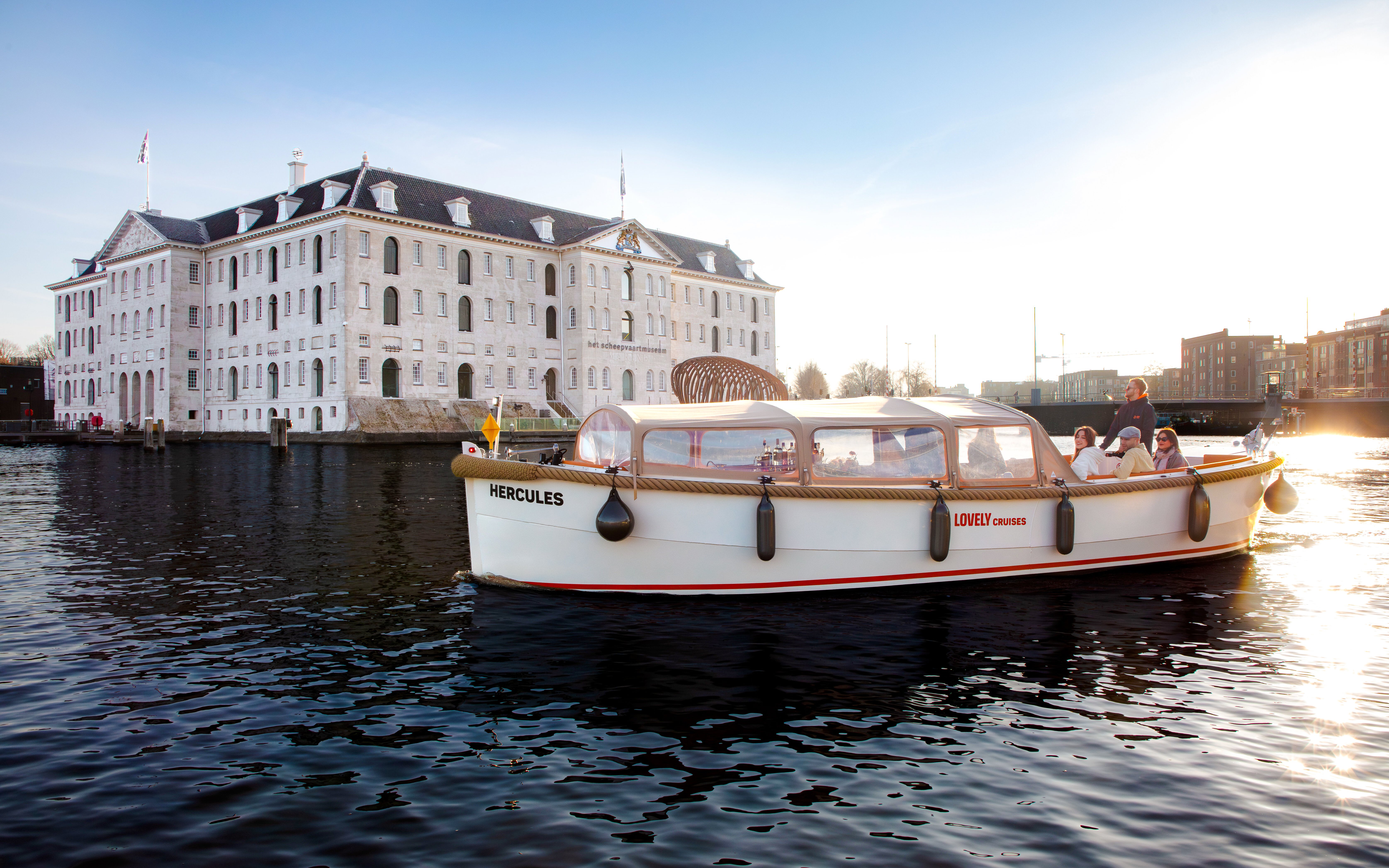 Open boat cruise near the Maritime Museum in Amsterdam.