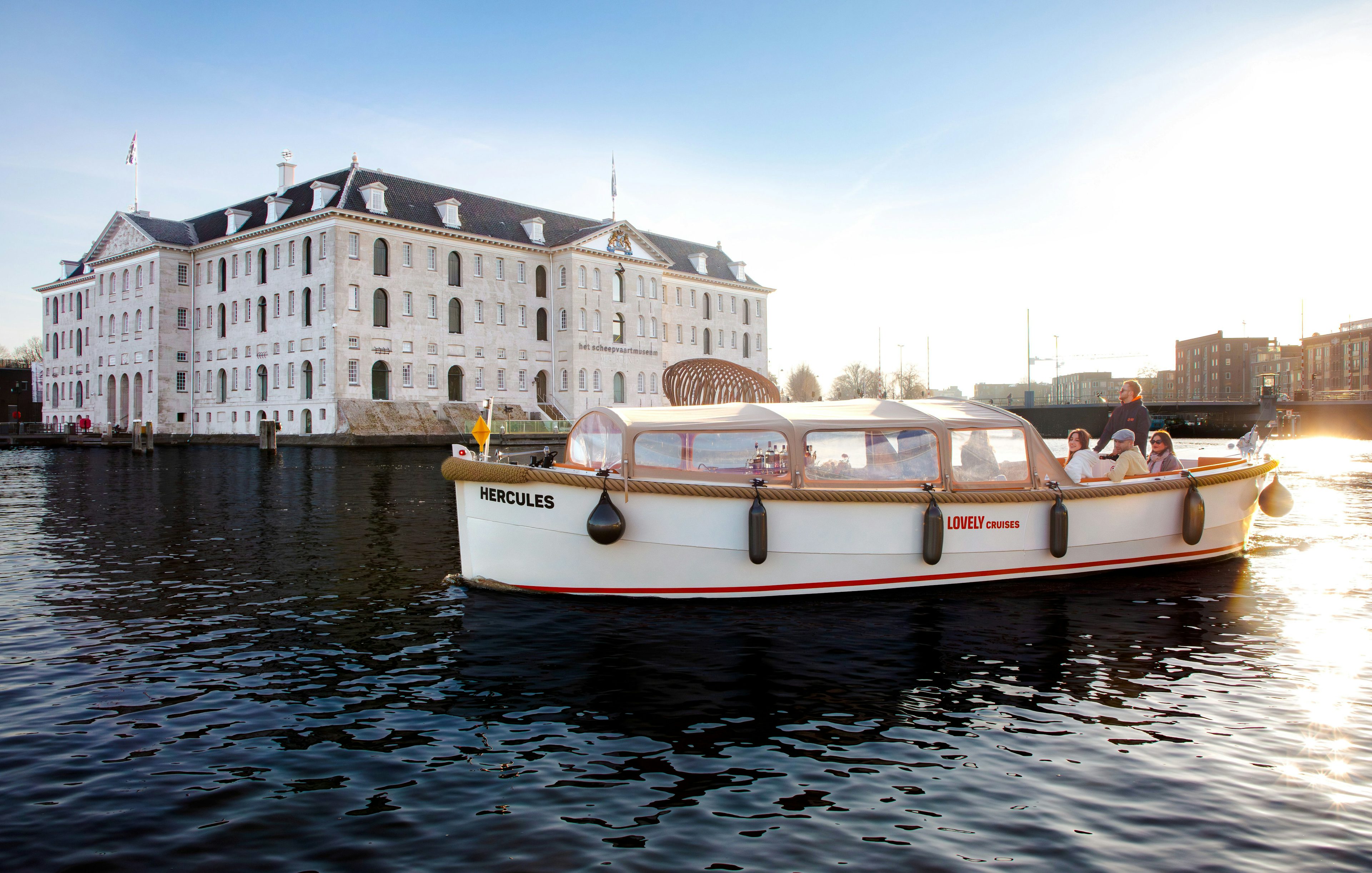 Open boat cruise near the Maritime Museum in Amsterdam.