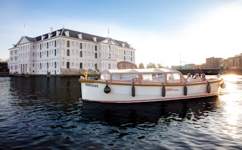 Open boat cruise near the Maritime Museum in Amsterdam.