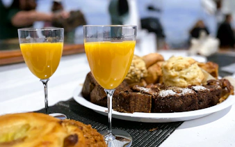 Mimosas and assorted baked cakes on the Liberty Star Boston.