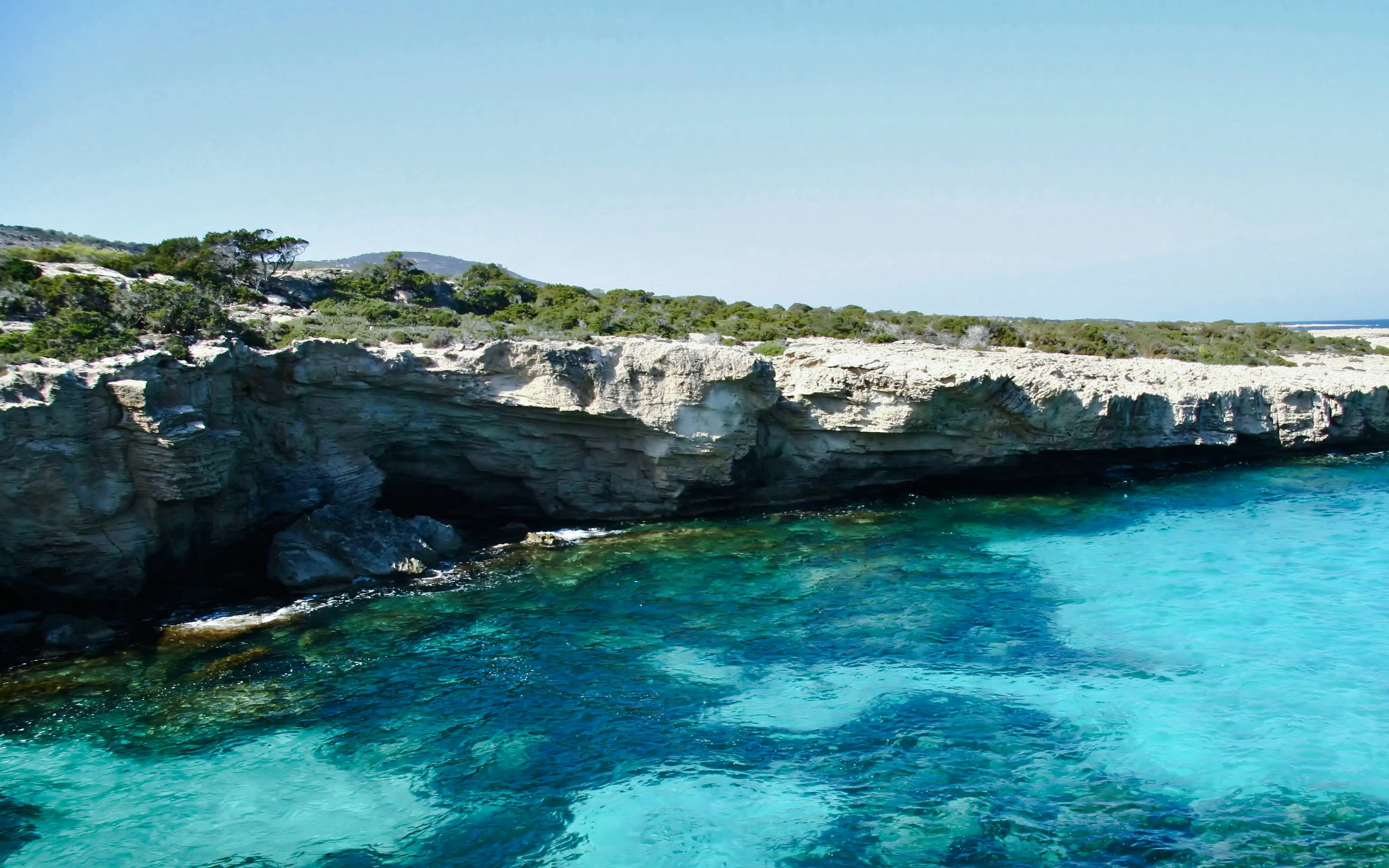 Cliffs and turquoise waters of Blue Lagoon, Akamas Peninsula, Cyprus.