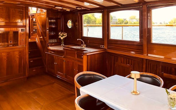 Inside view of the Fitzgerald boat's wooden interior during Berlin sightseeing cruise.