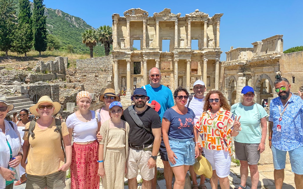 Tour group at the Celsus Library in Ephesus during Private Ephesus and Sirince Village Tour from Kusadasi.