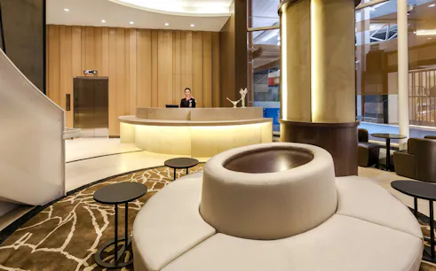 Reception area of Plaza Premium Lounge at Vancouver International Airport's domestic departures.