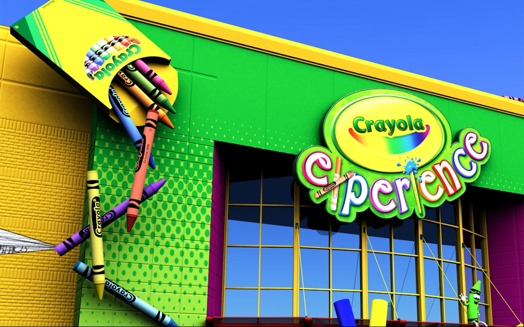 Crayola Experience entrance with giant crayons in Orlando.