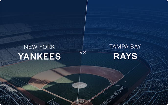 New York Yankees vs Tampa Bay Rays game at a baseball stadium.