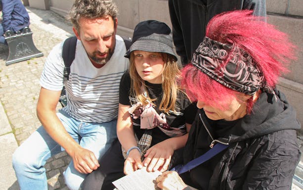 Group solving clues during Nyhavn Mystery Adventure in Copenhagen.