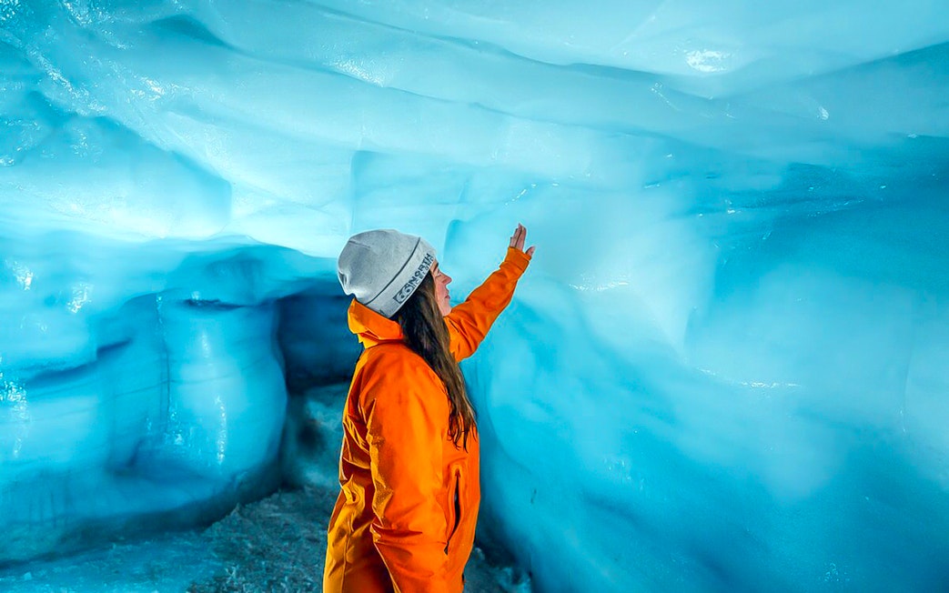 Guests exploring inside Ice Tunnel in Langjökull glacier, Iceland.