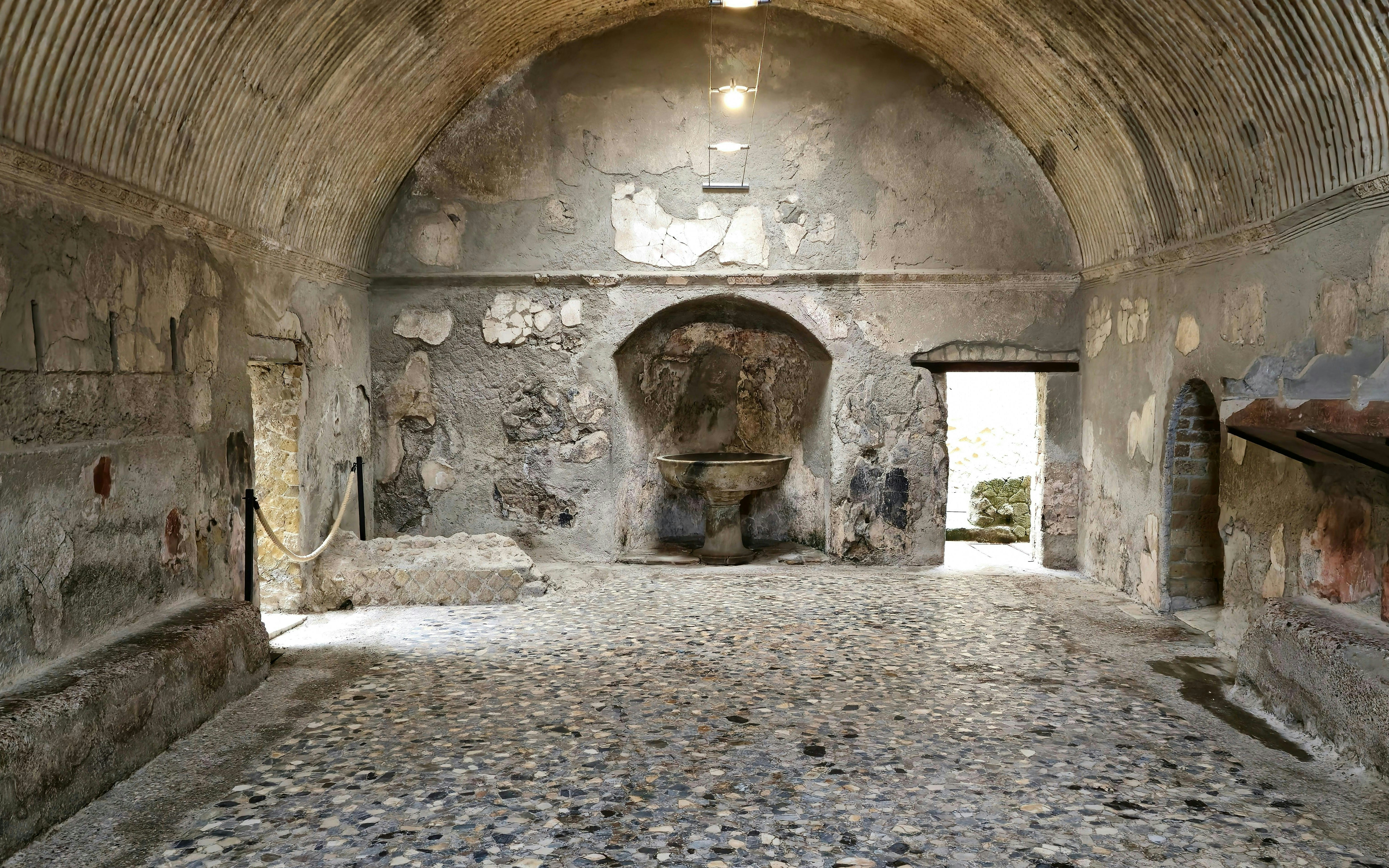 Ancient stone bathhouse interior at Herculaneum, Italy.