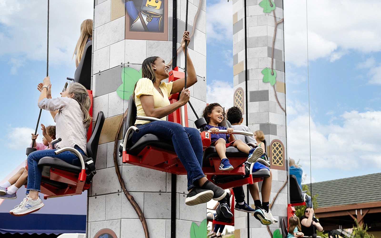 Guests enjoying a ride at Legoland New York.