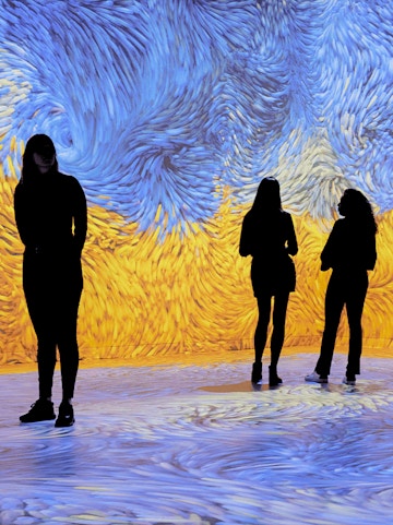 Guests exploring immersive art installation at Remastered Rotterdam.