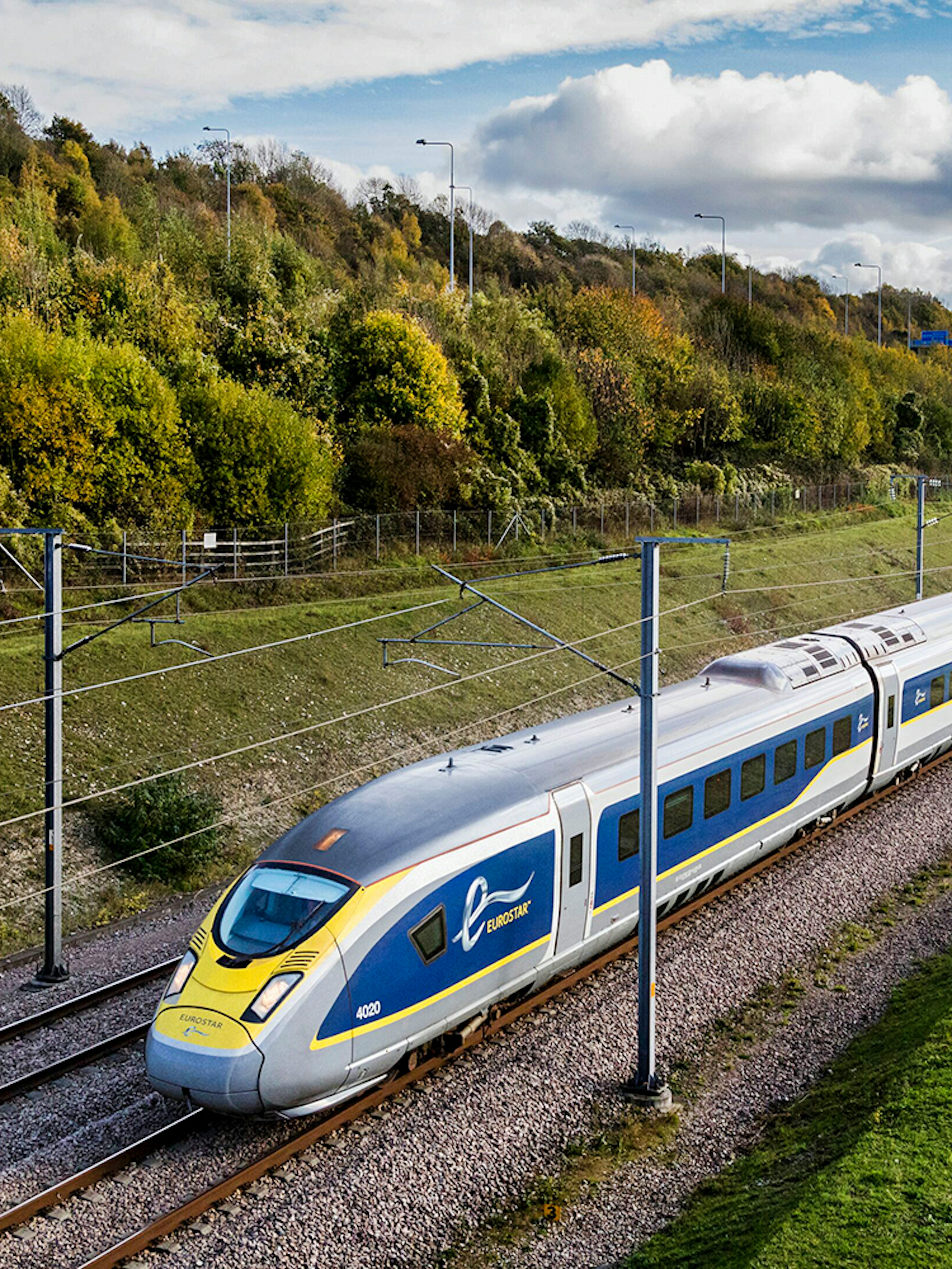Eurostar train traveling through countryside, Eurail Pass experience.