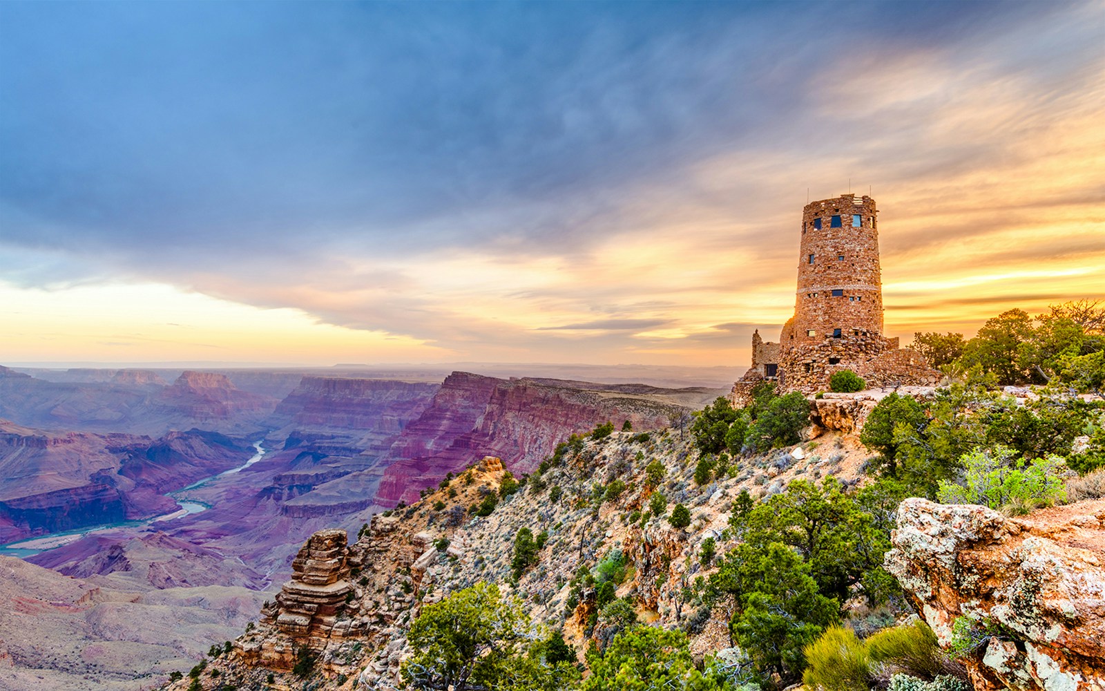 Desert View Watchtower overlooking the Grand Canyon, Arizona, USA, with expansive canyon views.
