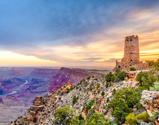 Desert View Watchtower overlooking Grand Canyon at sunset, Arizona, USA.