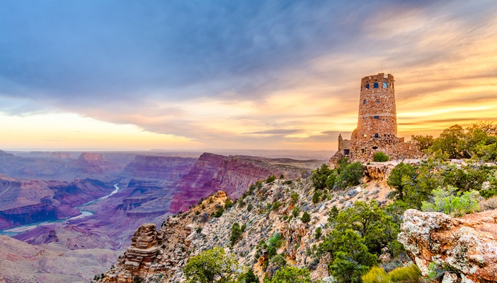 Desert View Watchtower overlooking the Grand Canyon, Arizona, USA, with expansive canyon views.