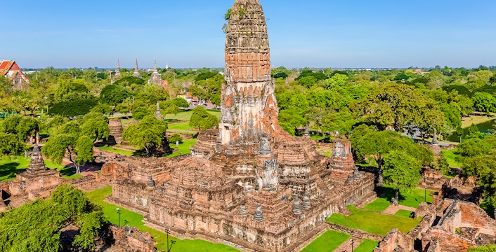 Aerial view of ancient temple ruins in Ayutthaya Historical Park, Thailand.