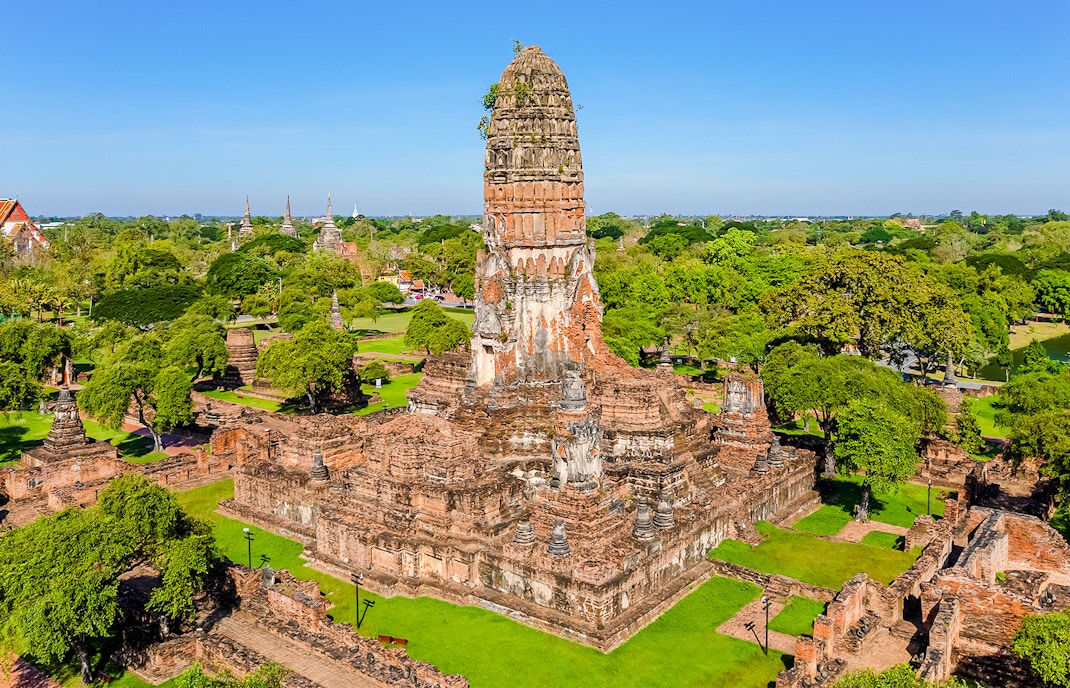 Aerial view of ancient temple ruins in Ayutthaya Historical Park, Thailand.