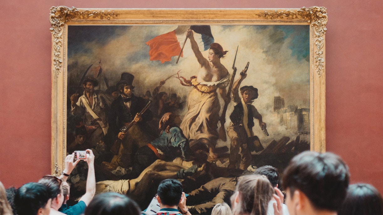 Tourists entering the Louvre Museum in Paris with Direct Entry Tickets
