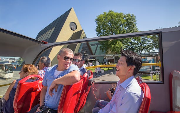 Oslo tourists on hop-on hop-off bus near Fram Museum.