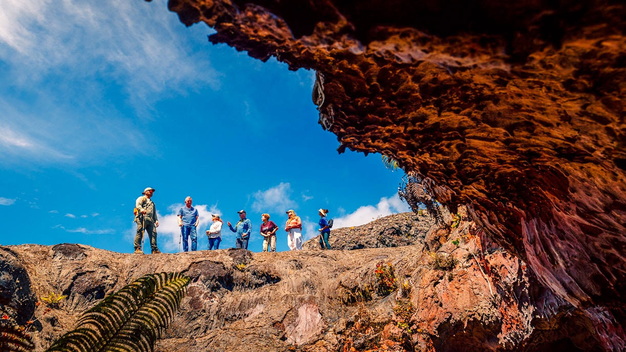 Guests exploring volcanic terrain on adventure tour in Hawaii.