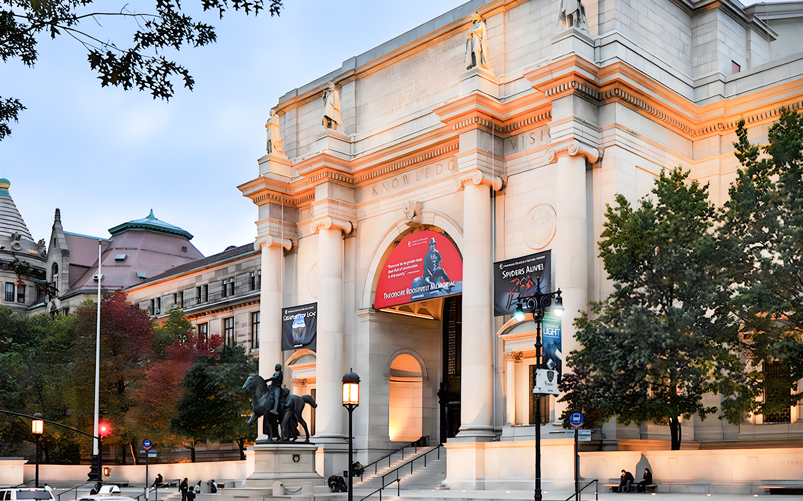American Museum of Natural History facade illuminated at night, New York City.