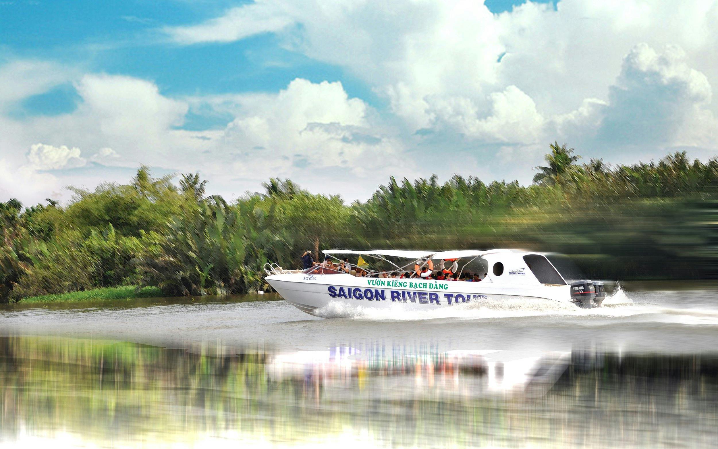 Speed boat on Saigon River for VIP Cu Chi Tunnels tour.