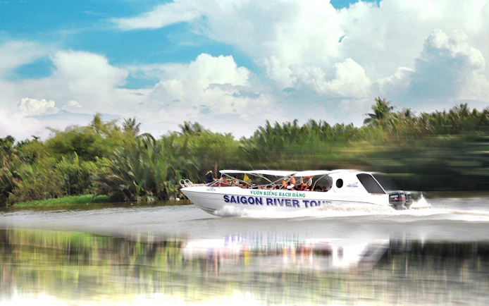 Speed boat on Saigon River for VIP Cu Chi Tunnels tour.