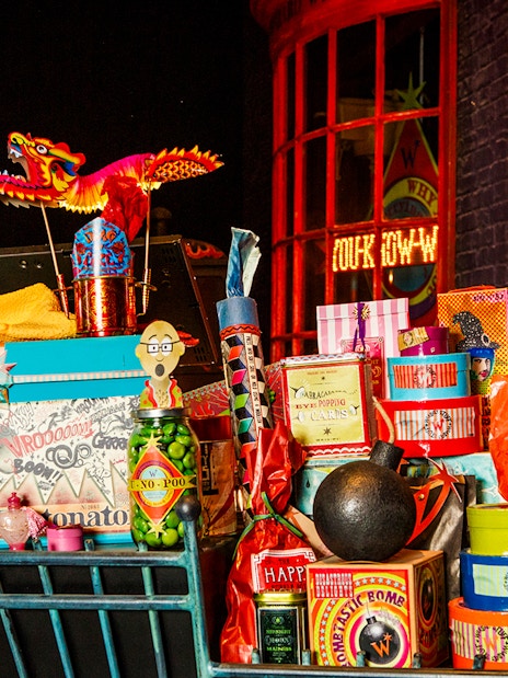 Colorful display of magical items at the Weasleys' Wizard Wheezes during Harry Potter London tour.