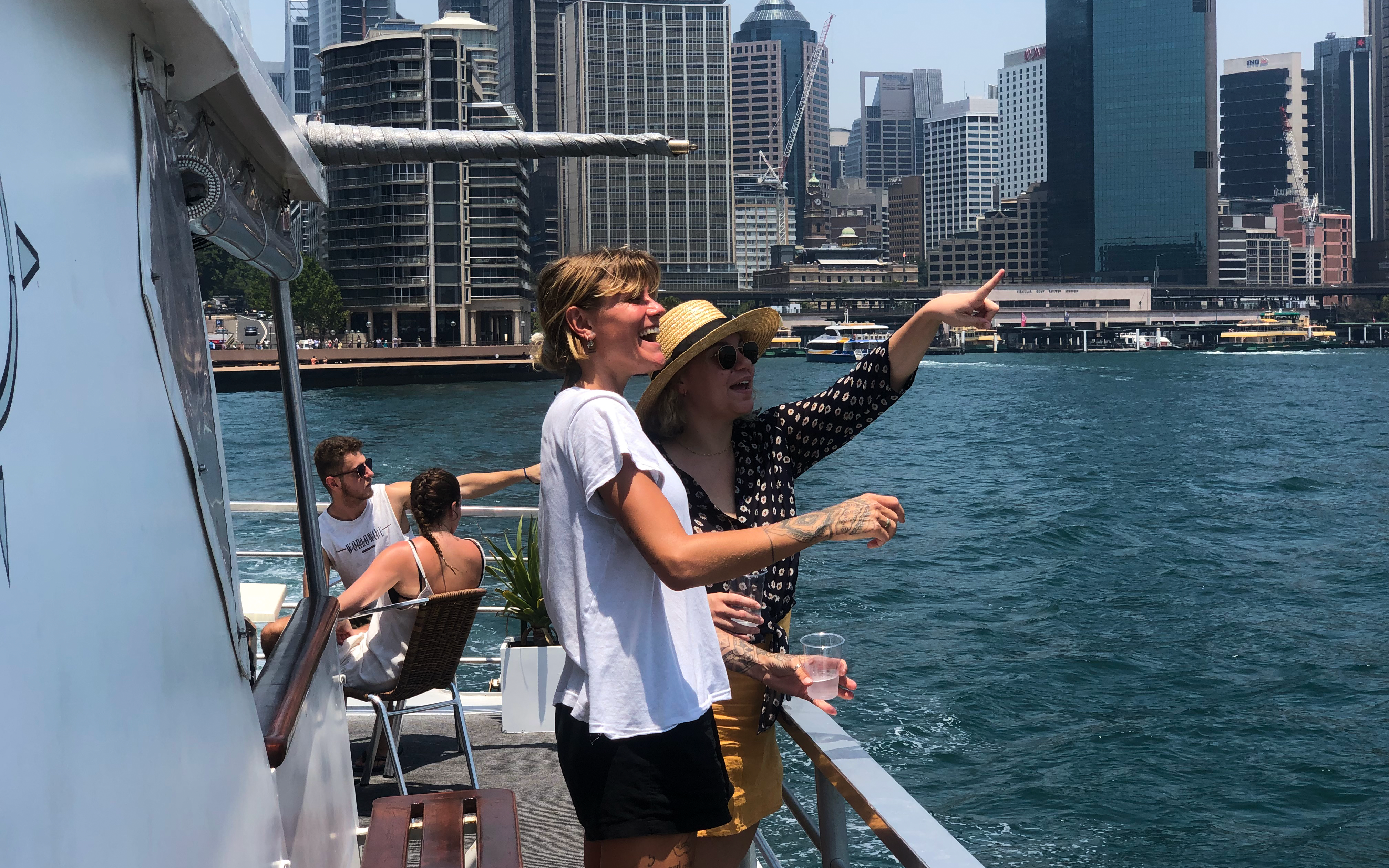 Guests enjoying views on a Sydney Harbour luxury dinner cruise.