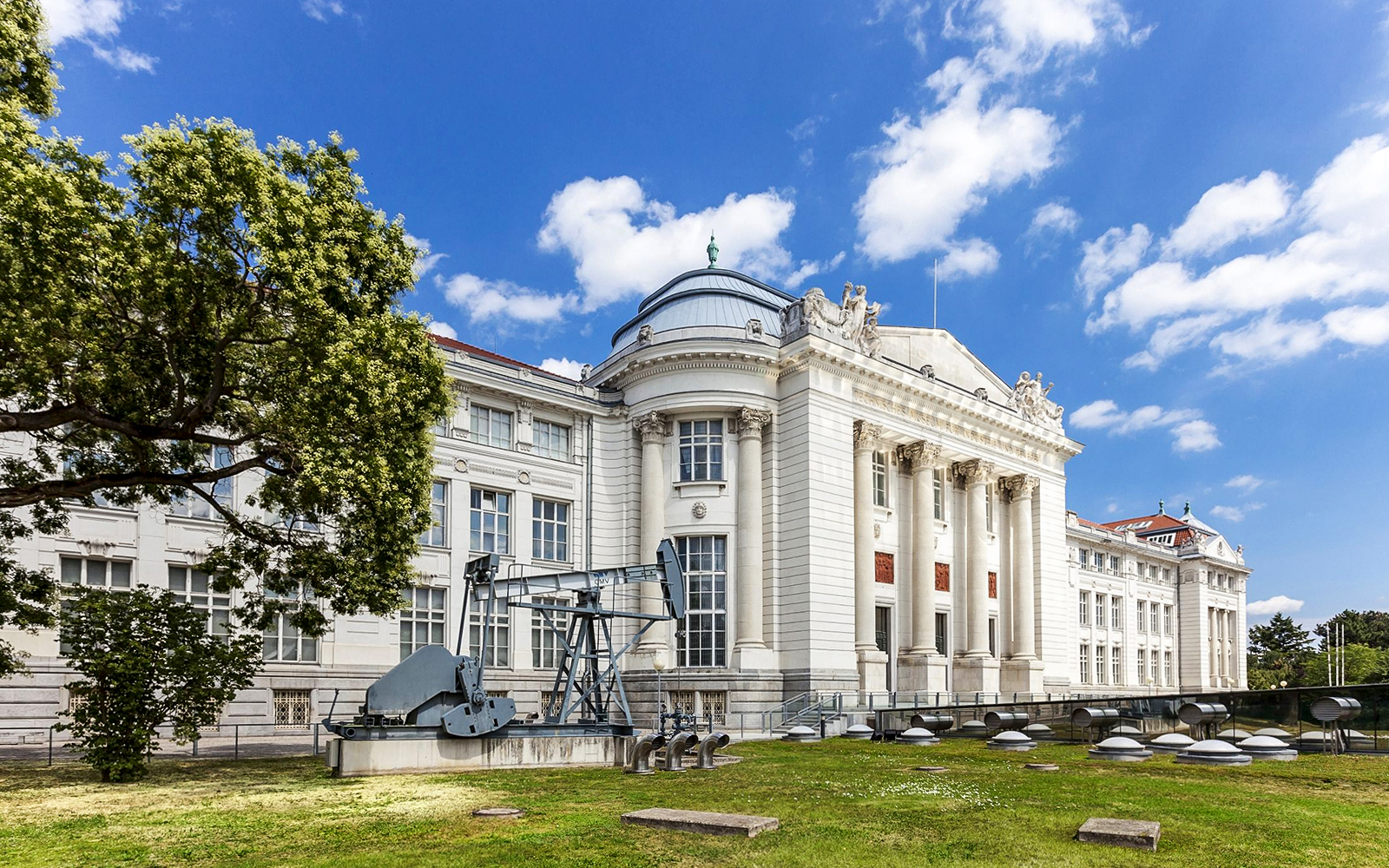 Vienna Museum of Science and Technology exterior with machinery display.