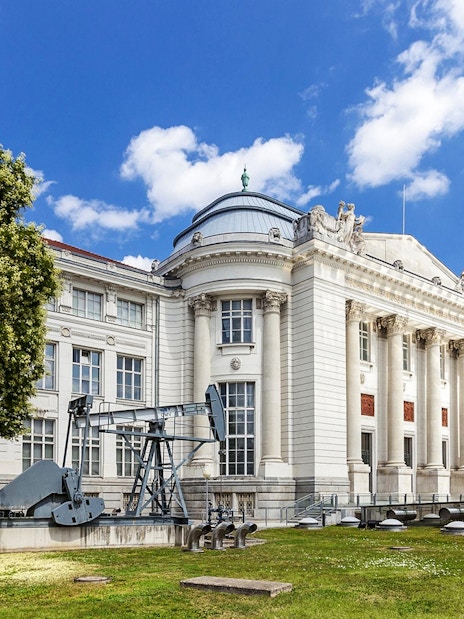 Vienna Museum of Science and Technology exterior with machinery display.
