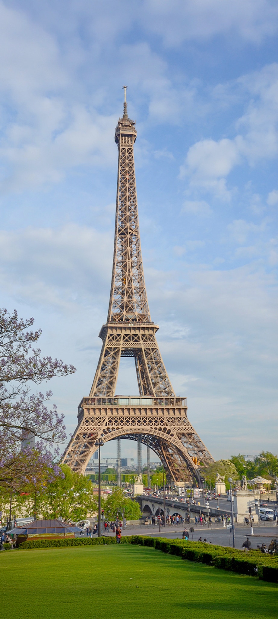 Eiffel Tower in Paris with a clear blue sky.