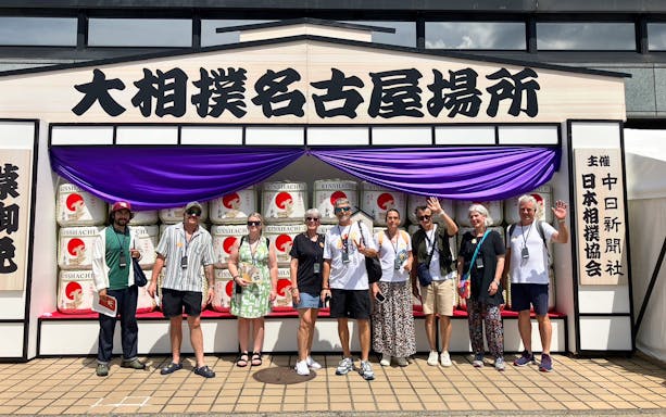 Visitors at Nagoya Grand Sumo Tournament venue entrance, Japan.