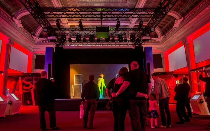 Visitors watching a music performance at The British Music Experience in London.