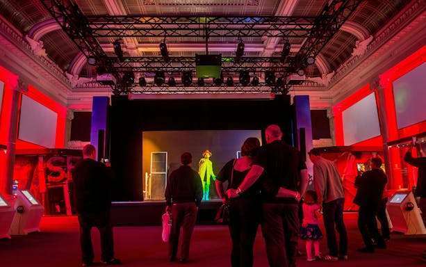 Visitors watching a music performance at The British Music Experience in London.