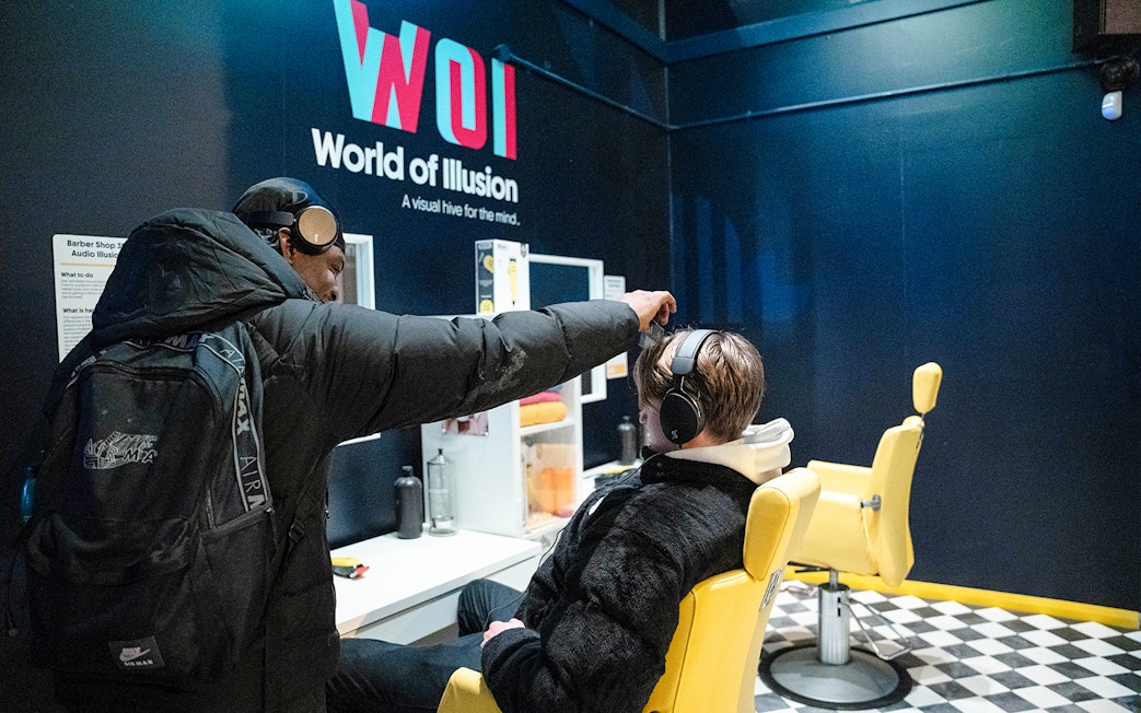 Guests experiencing audio illusions at World of Illusion, Dublin.