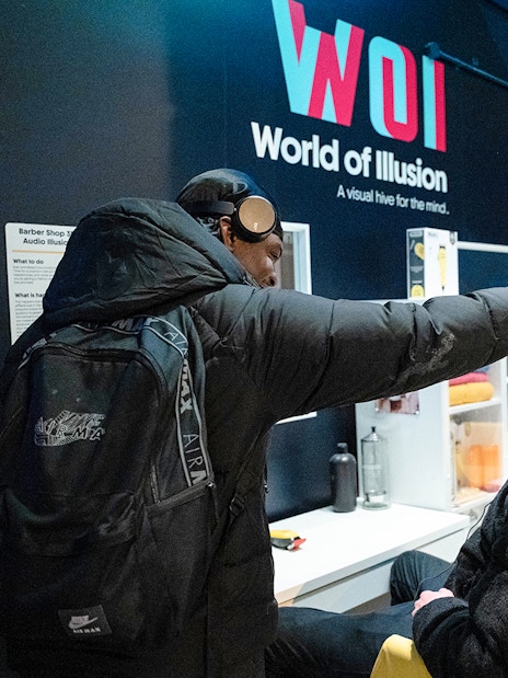 Guests experiencing audio illusions at World of Illusion, Dublin.