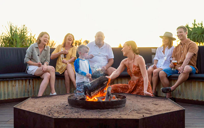 Group enjoying campfire at Top End Safari Camp, Finniss River.