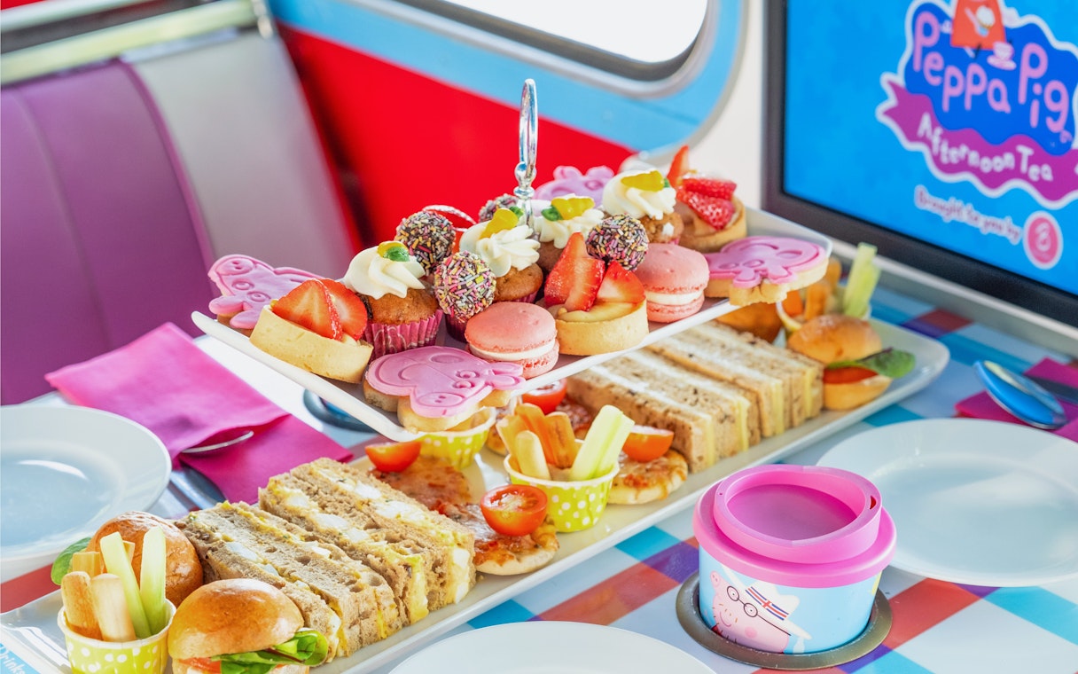 Snacks on Peppa Pig themed bus tour with sandwiches, cupcakes, and macarons on Brigit’s Afternoon Tea Bus.