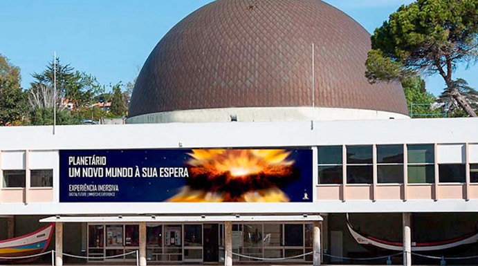 Navy Planetarium entrance with dome and promotional banner.