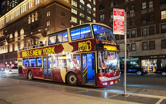 Big Bus at a New York City bus stop during the night tour.