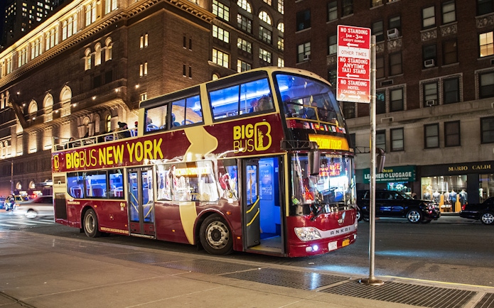 Big Bus at a New York City bus stop during the night tour.