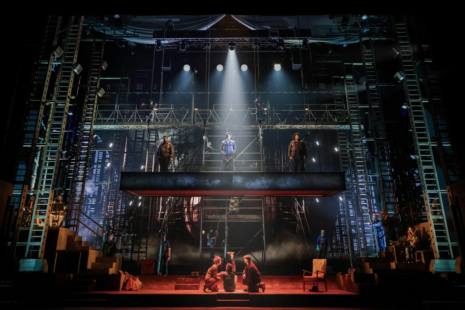 Stage performance of "The Last Ship" in Brisbane with actors on an industrial set.